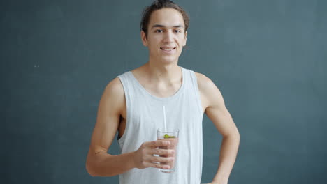man drinking smoothie