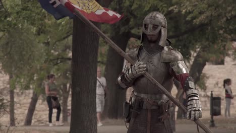 knight carrying a flag through the fortress in belgrade, serbia