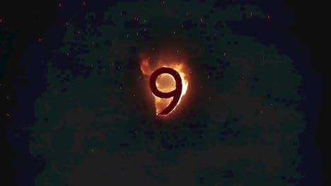 Animation-of-9-text-in-burning-flames-over-dark-background
