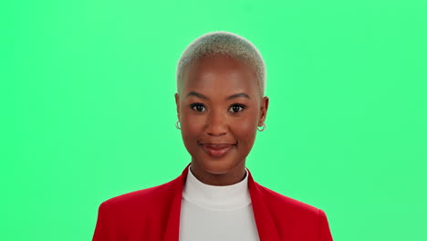portrait of a smiling woman in a red blazer against a green background