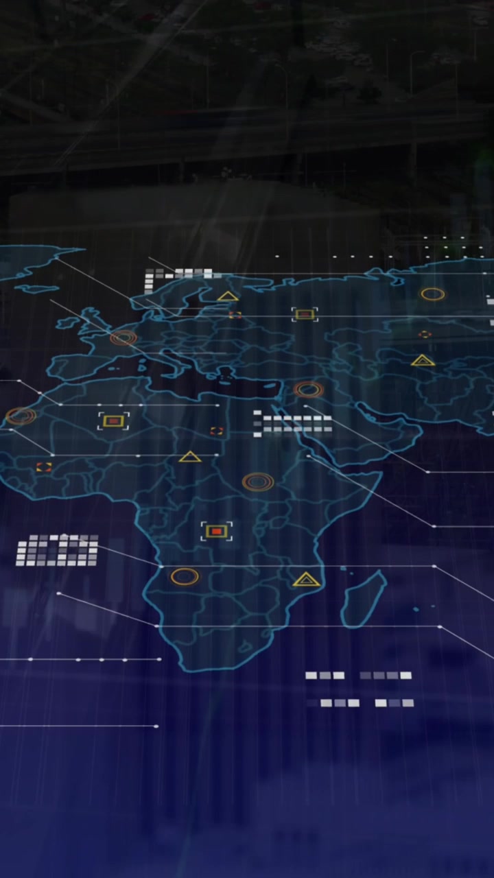 Animation of world map and data processing against aerial view of cityscape