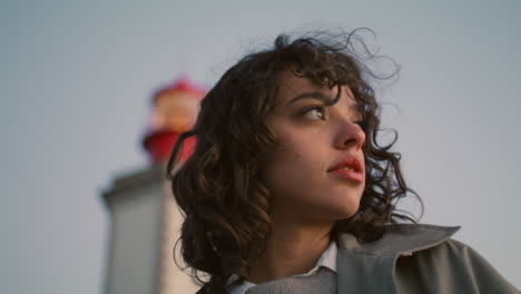 Portrait-worried-girl-posing-at-night-vertical-view.-Thoughtful-curly-woman