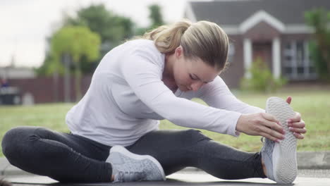 stretching well in preparation for a good workout