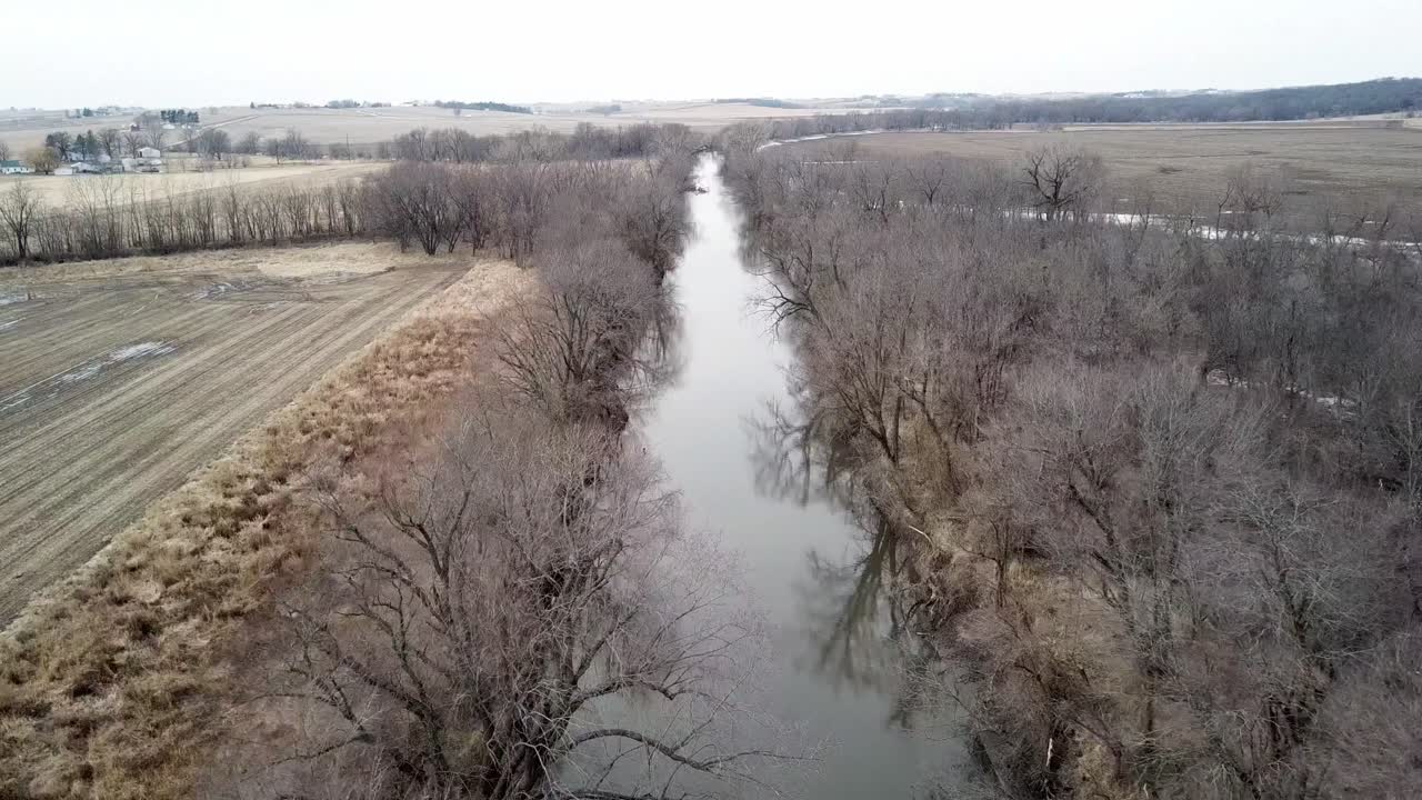 Winter Time Aerial Drone Video Of The Skunk River And The Rich Agricultural Farmland Surrounding Rural Lynnville, Iowa