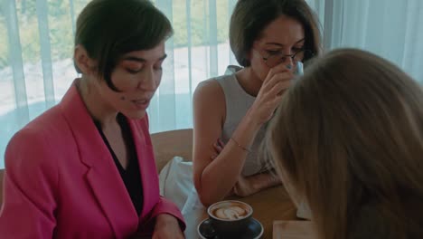 businesswomen meeting in a cafe