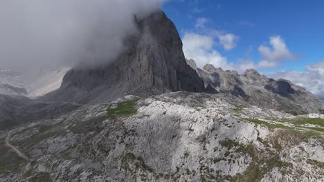 majestic mountain peak embraced by clouds
