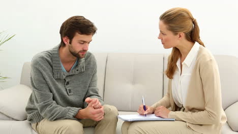 young man talking to his therapist