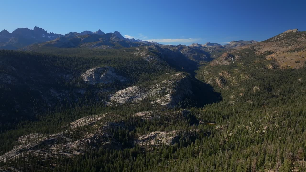 Minarets Vista Mammoth Mountain Lakes aerial drone California Sierras Banner Peak PCT Trail afternoon morning blue sky clouds nature landscape Pacific Crest Trail scenic Ridge pan left motion