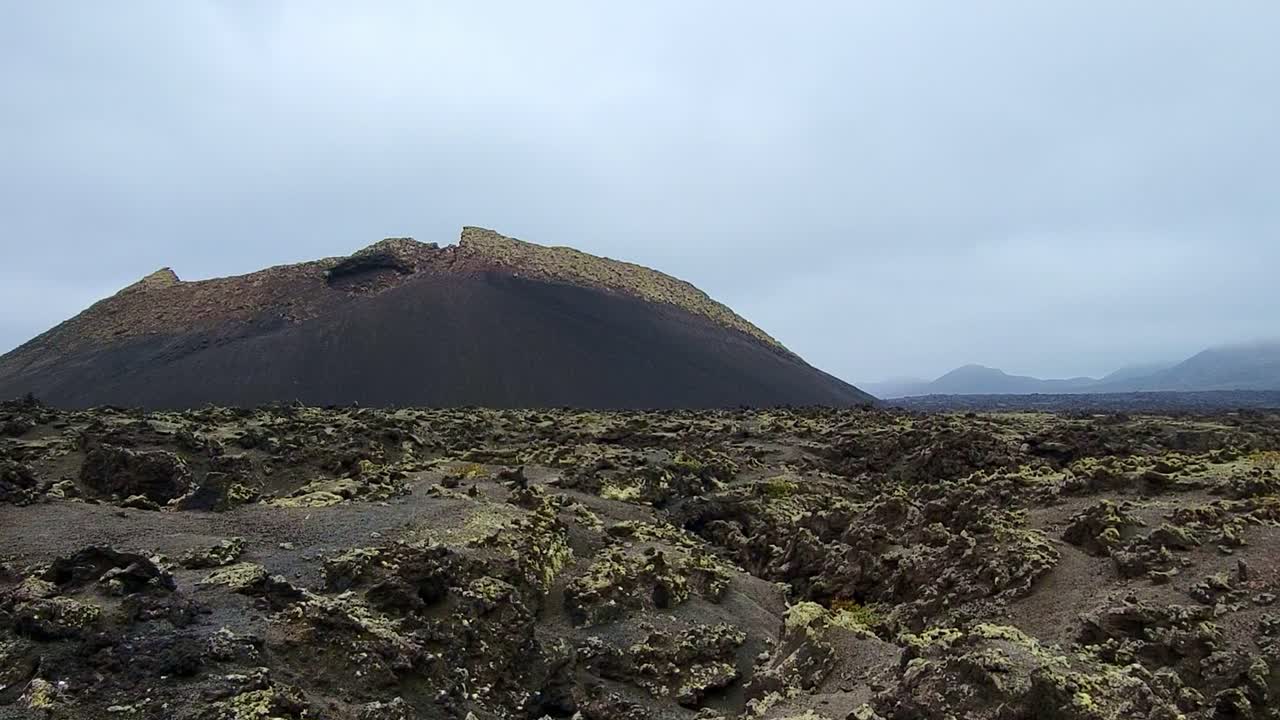 Crow volcano. Volcano crater and volcanic lava landscape. Lava sea. Lanzarote. Canary Islands.