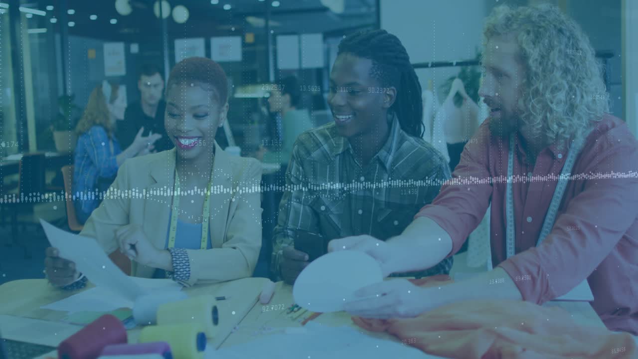 Fashion designer raising sketch sparking team examining hat swiping phone for feedback