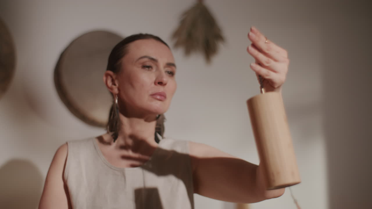 Woman Focusing on a Musical Instrument