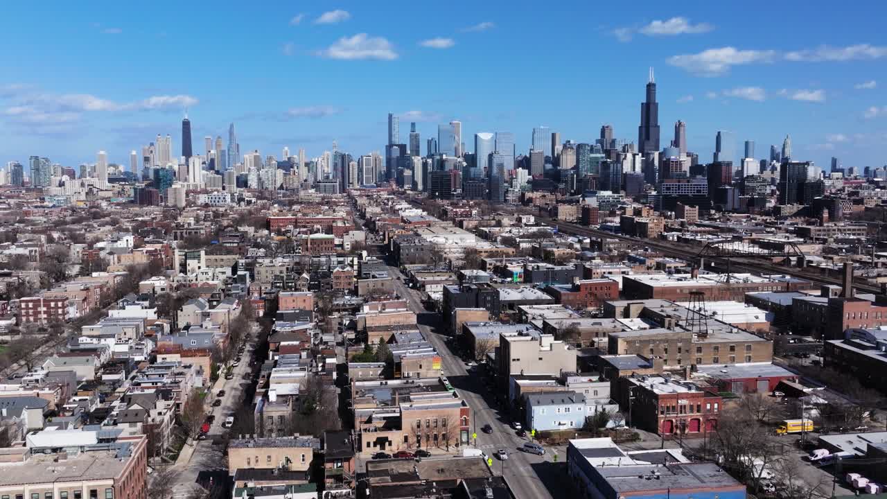 Drone Flying Away from Downtown Chicago with Skyline in Background