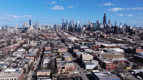 drone flying away from downtown chicago with skyline in background