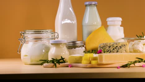 various dairy items arranged on a wooden surface