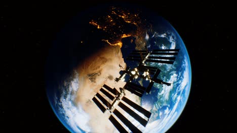 international space station in outer space over the planet earth orbit