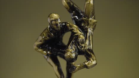 bronze rugby players figurine