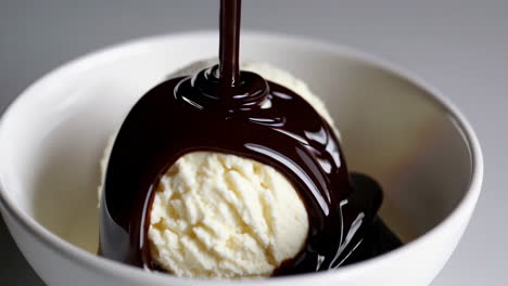 chocolate sauce poured over ice cream