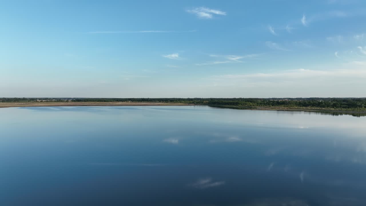 Aeria view of Osadnik Gaj&oacute;wka artificial lake in Gmina Przykona, within Turek County, Greater Poland Voivodeship, Poland