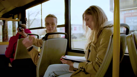 Young-people-sitting-in-the-bus