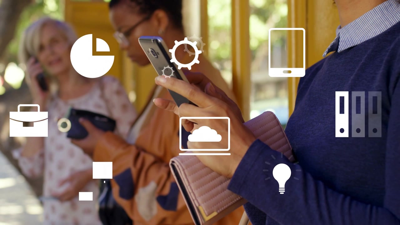 Right woman tapping phone while camera panning right, icons floating over yellow stop, showing tech