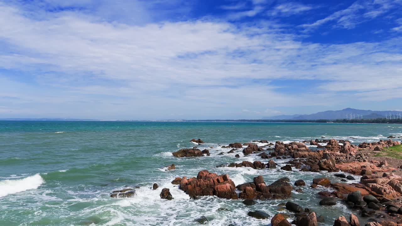 Aerial View Dolly of the Rocky on the Beach in Lam Dong in the Morning