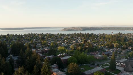 aerial view of houses and buildings at proctor district with commencement bay in tacoma, washington, usa