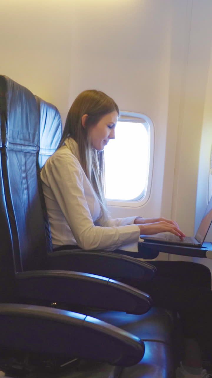 Woman working on plane