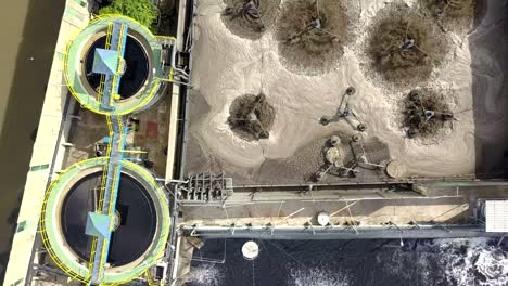 aerial top view 4k of waste water treatment system in industrial estate