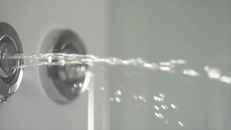 water spraying from bathroom faucets