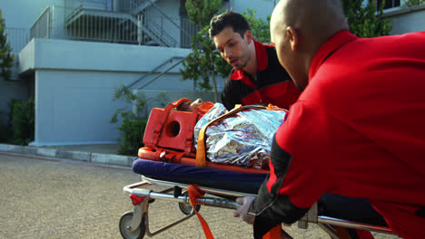 paramedics rushing a patient in emergency