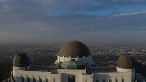 Aerial-fly-over-Griffith-Observatory-during-sunrise