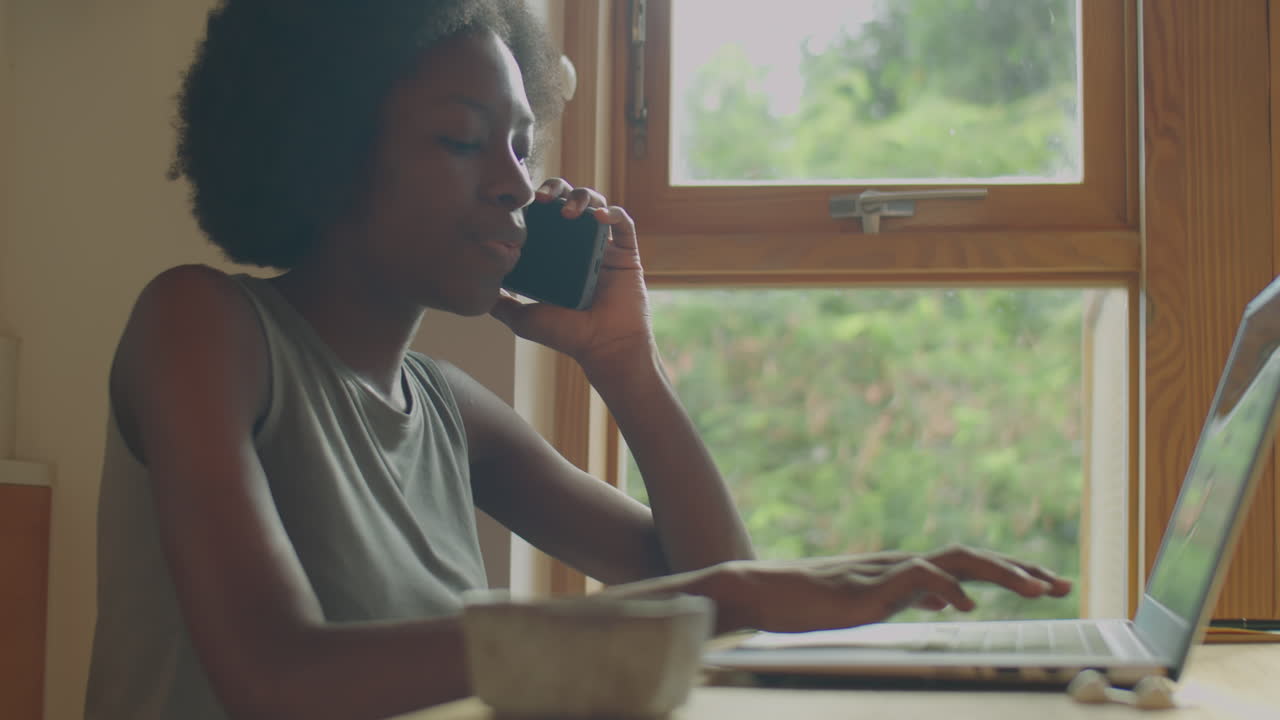 Black Woman Freelancing at Home