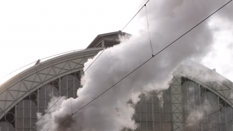 steam pipe of steam locomotive of railway. factory pipe of steam locomotive.