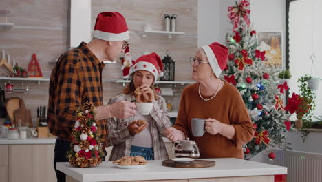 grandparents enjoying spending time with grandchild celebrating christmastime