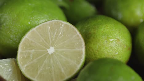 a round slice of a juicy lime slowly rotating.