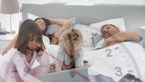 Clock-animation-overlay-with-family-playing-on-bed-with-children