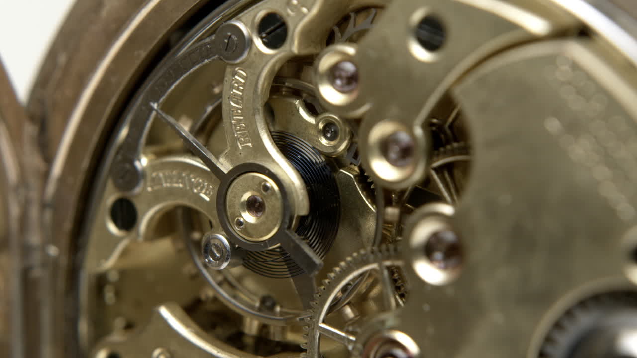 Antique gold pocket watch movement macro close up