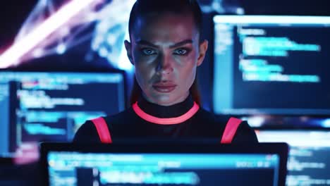a focused individual immersed in a high-tech digital environment, illuminated by neon lights, engages with complex code and data on computer screens, showcasing the intersection of technology and human expertise.