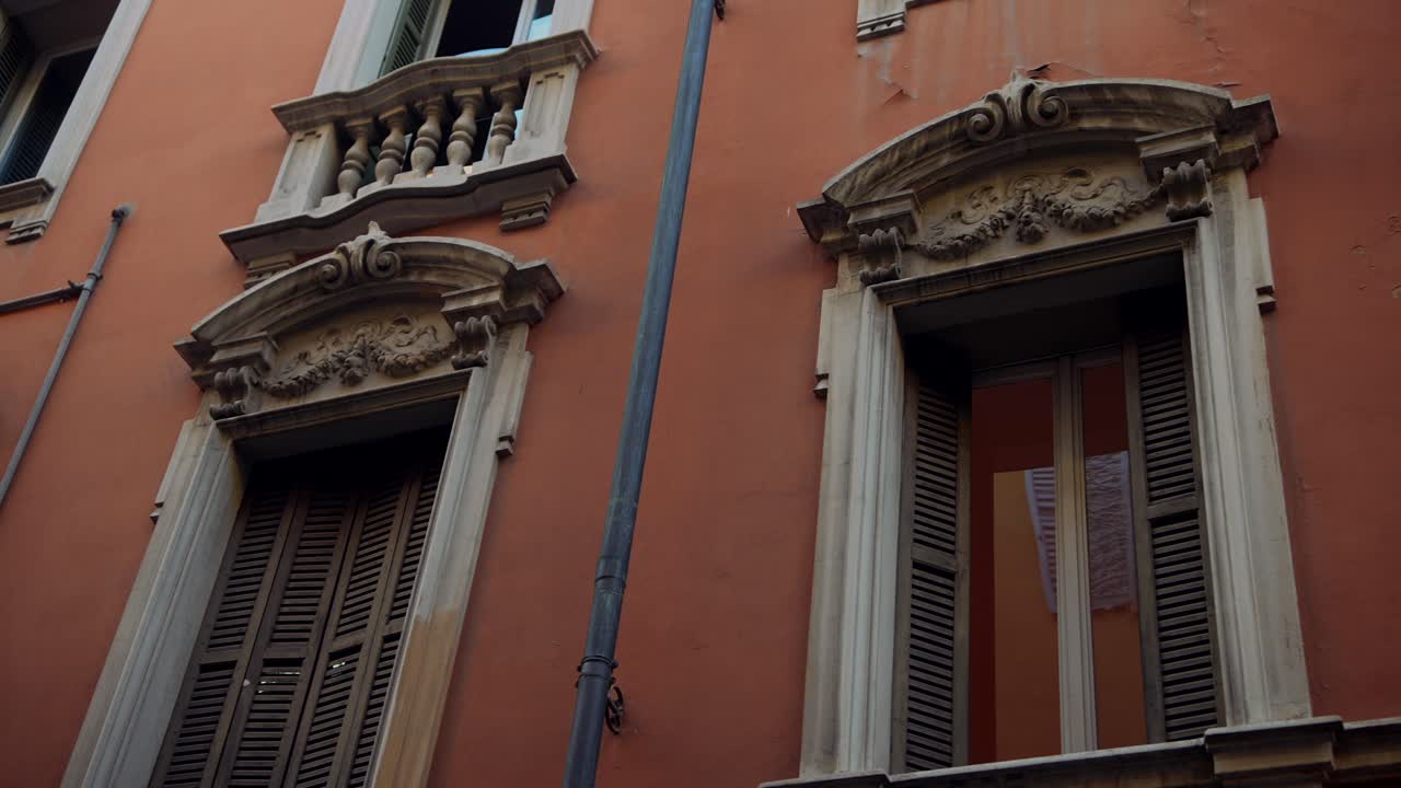 Vintage Italian Building Facade with Ornate Details