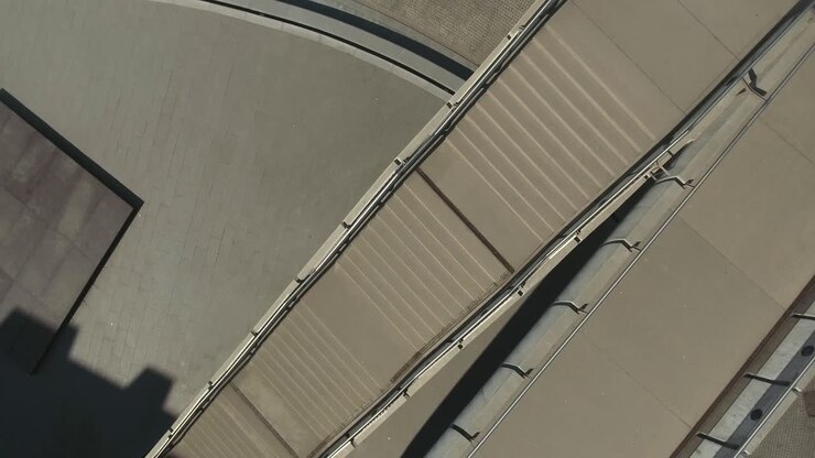 Concrete stairs and a bridge in a city in Central Europe