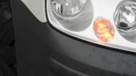 car indicating it is going right. flashing light