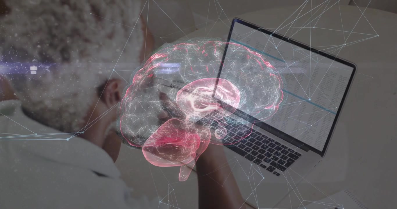 Professional typing on laptop starting rotating brain hologram with pulsing network mesh technology