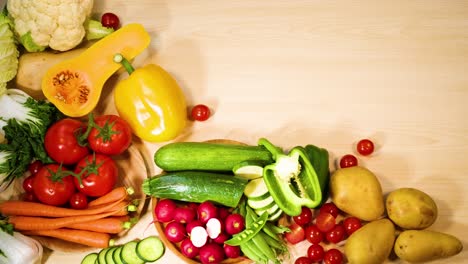 assorted vegetables arranged neatly on wooden surface