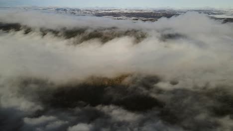 a valley trough the clouds