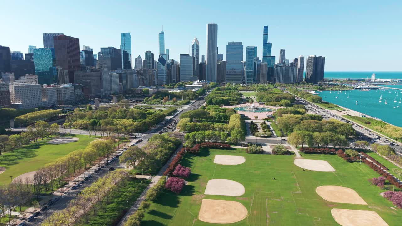 Drone Shot of Chicago Cityscape Skyline and Millennium Park, Skyscrapers, Towers and Landscape on Sunny Day