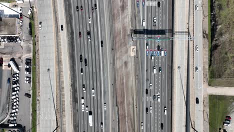 Top-down-video-of-cars-driving-down-interstate-Atlanta,-Georgia