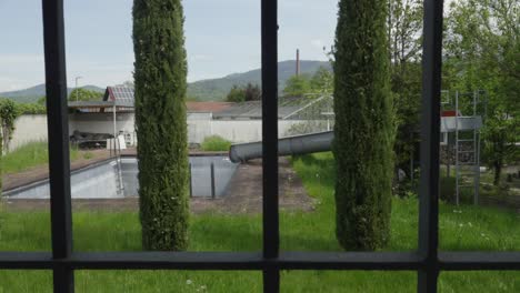 Entertaining private space of resort with slide and swimming pool for water fun