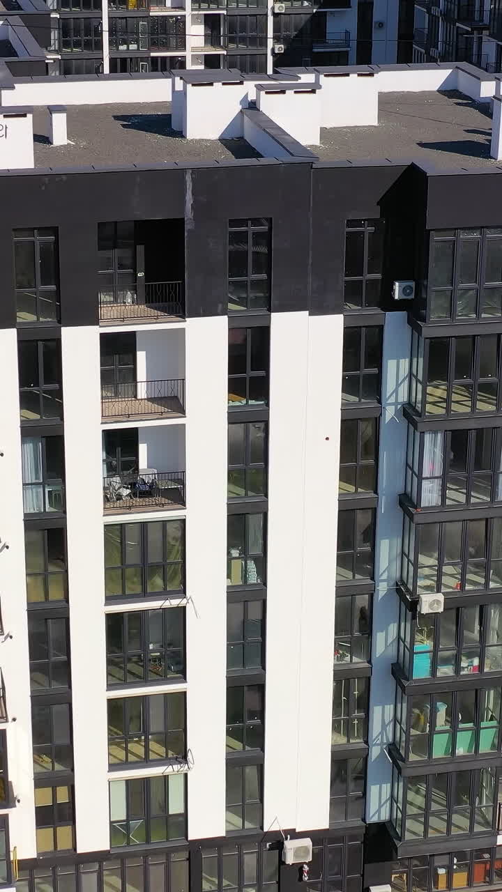 Aerial view of residentail community. Exterior of high rise multi story apartment building