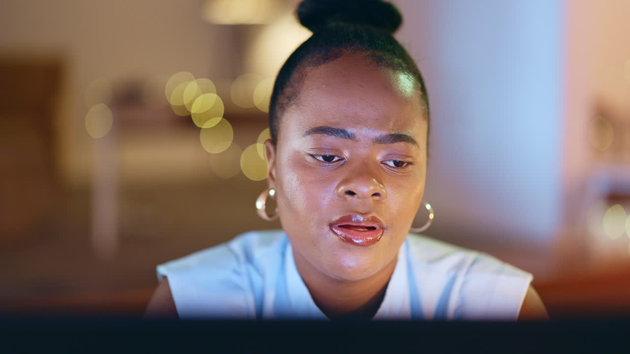 Black woman, headache and stress at computer