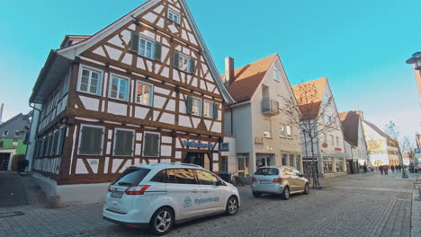 street with historical houses in metzingen, germany